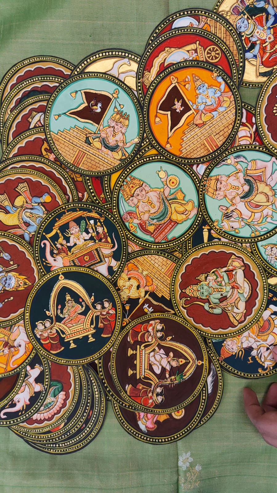 Individual circular Ganjifa cards on silk